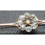 An antique aquamarine and pearl bar brooch in 9ct