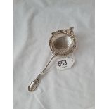 A decorative tea strainer with cast rim - Sheffield 1902 - 55gms