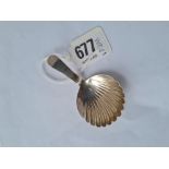 A George II caddy spoon with shell bowl