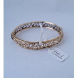 A vintage ladies bangle in 9ct - 9.3gms