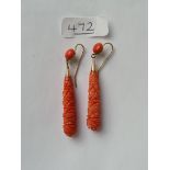 A PAIR OF 19TH CENTURY CARVED CORAL EARRINGS