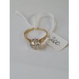 A single white stone ring in 14ct gold - size V - 3.3gms