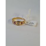 A ruby & diamond 3 stone ring in 18ct gold - size R