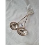 A pair of Georgian fiddle-pattern sauce ladles with crested terminals - London 1824 by WC - 130gms