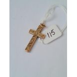 An engraved cross pendant in 9ct 2.4g