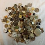 LARGE BAG OF VARIOUS WATCH MOVEMENTS, SYMBOLS & COSTUME JEWELLERY