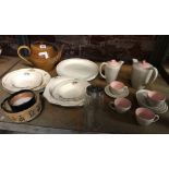SHELF OF CHINAWARE INCL; CUPS, TEAPOT & HOT WATER POT FROM POOLE, PLATES, DISHES & A SUGAR CASTER
