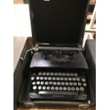 CASED CORONA STERLING TYPEWRITER IN GOOD CONDITION - MANUFACTURED IN 1936
