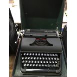 CASED OLYMPIA TYPEWRITER IN GOOD CONDITION