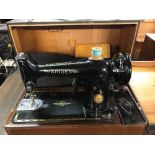 CASED SINGER SEWING MACHINE (LIGHT A/F)