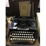 CASED ROYAL TYPEWRITER PRODUCED IN AMERICA IN GOOD CONDITION