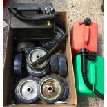 BOX WITH 3 PLASTIC PETROL CANS & A QTY OF WHEELS
