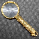 CHASED YELLOW METAL MAGNIFYING GLASS WITH LOOP