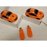 2 MINI OPTICAL MOUSES, STYLED IN THE FORM OF RAC RALLY CAR WITH 2 USB STICKS