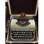 CASED BYRON TYPEWRITER IN GOOD CONDITION