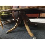 INLAID MAHOGANY OVAL COFFEE TABLE ON BALL & CLAW FEET