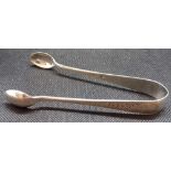 AN ATTRACTIVE PAIR OF SILVER SUGAR TONGS - SHEFFIELD 1910