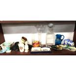 SHELF OF CHINAWARE & GLASSWARE CONSISTING OF CHERUB WALL PLAQUES, A WADE CAMEL ASHTRAY, ROYAL