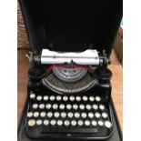 CASED UNDER WOOD PORTABLE TYPEWRITER - GOOD CONDITION