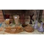 SHELF OF COLOURED GLASSWARE INCL; VASES, DRESSING TABLE SET & JUG