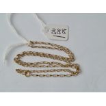 An oval link chain in 9ct - 1.8gms