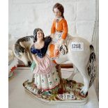 Staffordshire figure Entitled First Ride 12 in high