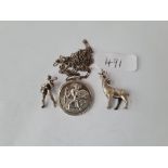 A silver St Christopher, stag & guitar charms etc.