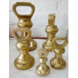 Set of five brass avery bell shaped weights from 7ibs