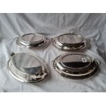 Group of 4 oval entrée dishes with covers