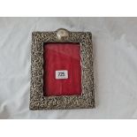 Oblong photo frame with pierced scroll border. Birmingham 1899? 8.5 in high