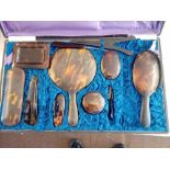 Tortoiseshell dressing table set in fitted case