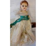 Small china faced doll in lace dress