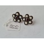 A pair of enamel garnet & pearl set silver earrings