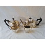 Oval half fluted boat shaped tea set and an oblong teapot