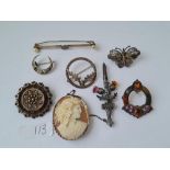 Eight silver assorted brooches 51g inc