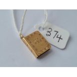 A bible charm in 9ct - 1.47gms