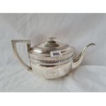 George III Oval teapot with bright-cut decoration. Rim foot 11 in over handle. London 1805 by J