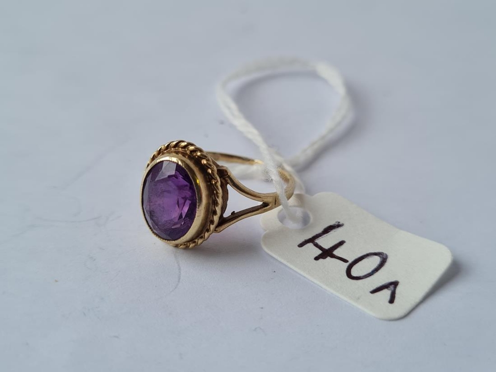 An amethyst ring in 9ct - size K - 2.5gms