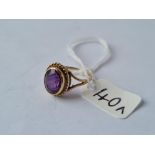 An amethyst ring in 9ct - size K - 2.5gms