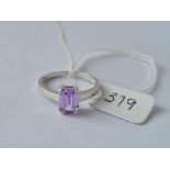 A white gold ring with large square cut purple stone in 9ct - size P/Q - 2.75gms