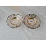 Pair of pierced sweet dishes on pedestal stems. 4.25 in diam. London 1915. 191gms