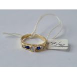 A blue & white stone ring in 14ct gold - size N - 2.8gms