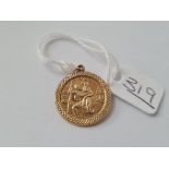 A gold St Christopher pendant in 9ct - 1.4gms