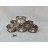 Set of six Eastern silver napkin rings with vacant shield panels. 75gms