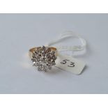 A vintage diamond star burst ring in 9ct - size M - 3.84gms