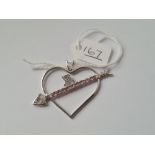 A DIAMOND HEART PENDANT WITH PINK SAPPHIRES