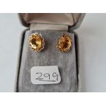 A pair of citrine earrings in 9ct