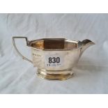 Panelled Art Deco cream jug on rim foot. Birmingham 1941. 148gms