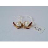 A pair of pearl & stone set earrings in 9ct 3.7g inc