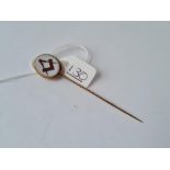 A gold mounted masonic stick pin with sardonyx intaglio